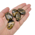 Oval Tiger Eye crystal pendant from GemstoneGO featuring natural stone jewelry making bead with a smooth polished surface.