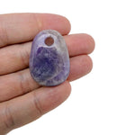 Amethyst oval crystal pendant from GemstoneGO, showcasing a polished natural stone bead for jewelry making.