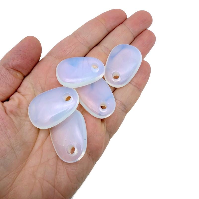 Opalite oval crystal pendant from GemstoneGO, natural stone jewelry making bead with smooth oval shape and polished finish.