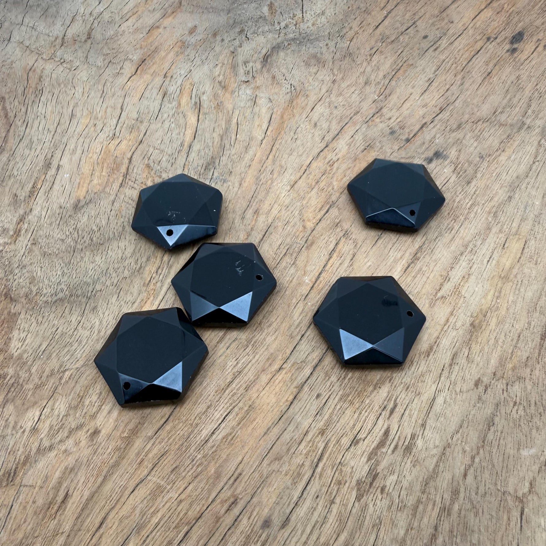 Faceted black obsidian hexagon crystal pendant necklace with a gemstone bead design by GemstoneGO.