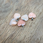Faceted orange aventurine heart crystal pendant from GemstoneGO, showcasing a natural gemstone charm with detailed faceting.