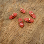 Cherry Quartz double terminated crystal pendant featuring a natural gemstone point with vibrant red hues, ideal for jewelry and healing.