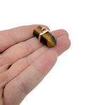 Natural Tiger Eye crystal pendant featuring a double terminated gemstone point, crafted by GemstoneGO.