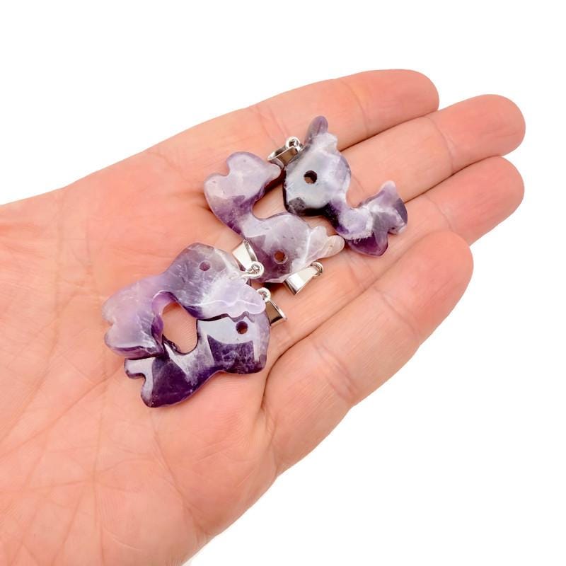 Amethyst deer crystal pendant necklace featuring a gemstone deer charm on a silver chain, crafted by GemstoneGO.