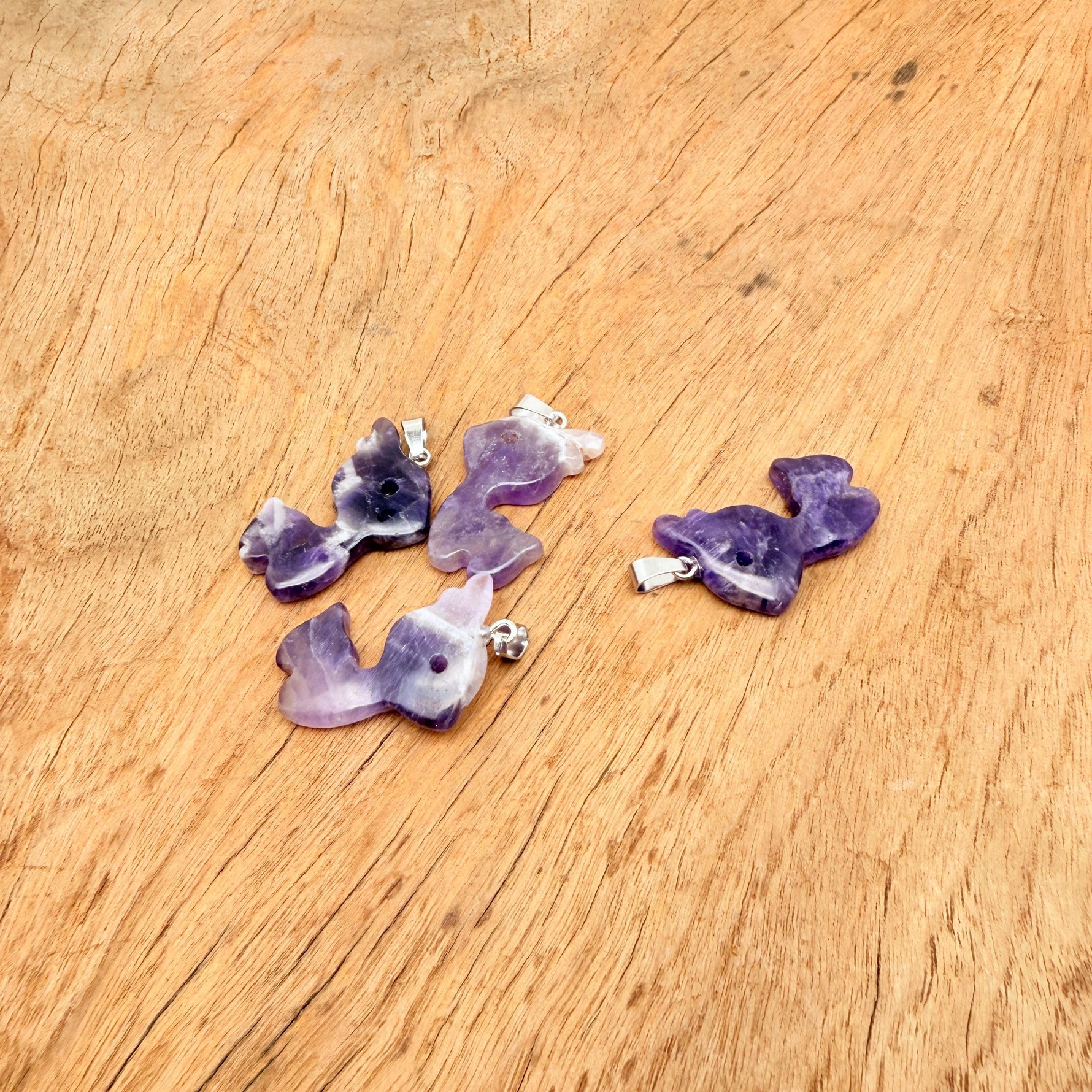 Amethyst deer crystal pendant necklace featuring a gemstone deer charm, designed by GemstoneGO.